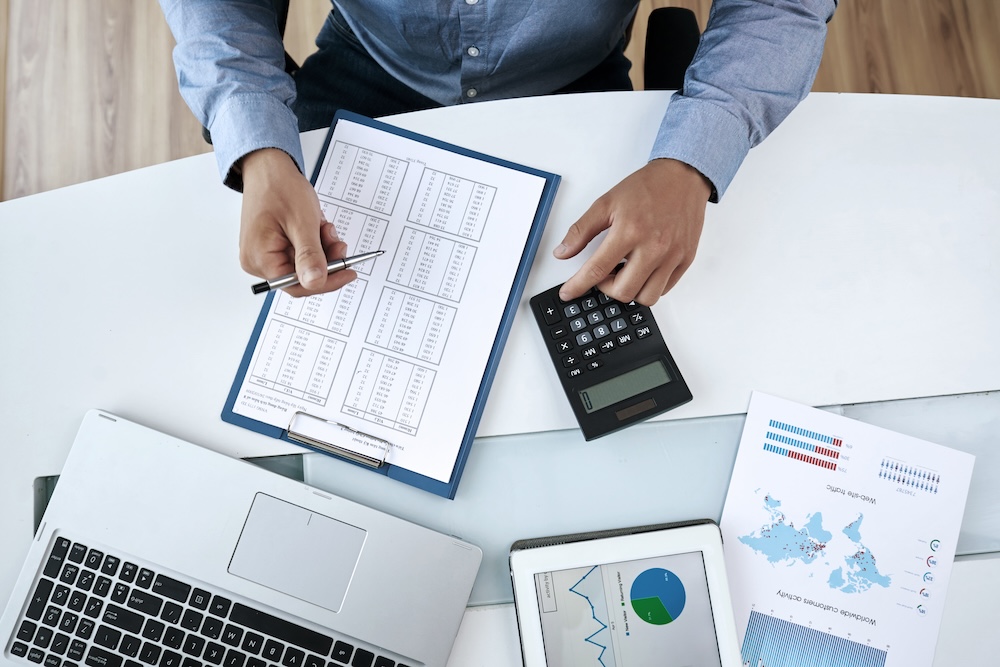 a person working on a finical report